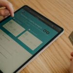 A developer working on a custom fintech backend, showcasing coding and architecture planning for a secure platform.